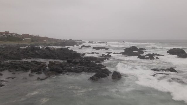 la ballena beach drone flying low rocks 