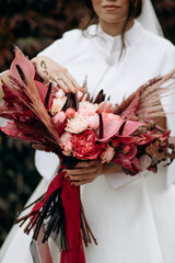 Wedding. The bride's bouquet. Wedding bouquet . A bouquet of red flowers