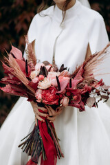 Wedding. The bride's bouquet. Wedding bouquet . A bouquet of red flowers