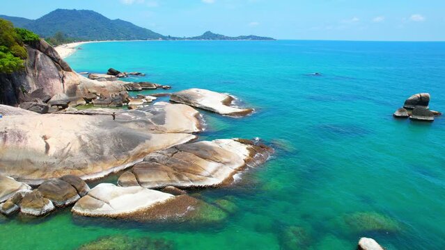Hin Ta Hin Yai, also known as the Grandfather and Grandmother rocks, is a popular tourist attraction located on the southern coast of Koh Samui in Thailand. tropical and summer concept. 4K Drone
