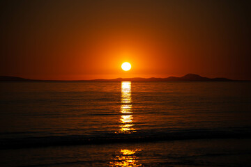 Fototapeta na wymiar Sunset at Barmouth Beach, Wales