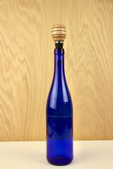 Bottle Stopper in a Blue Wine Bottle