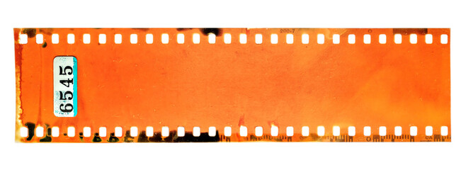 Start of 35mm negative filmstrip, first frame on white background, real scan of film material with cool scanning light interferences and developing smear marks on the film material.