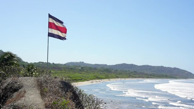 Costa Rica flag pura vida Nosara guiones pelada waves holidays pacific ocean beautiful view flag in the wind