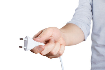 Hand holding white plug cut out