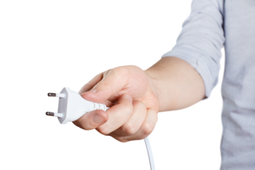 Hand holding white plug cut out