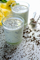 yogurt with chia seeds on a white background