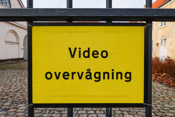 Copenhagen, Denmark A yellow Video Surveillance sign in Danish.