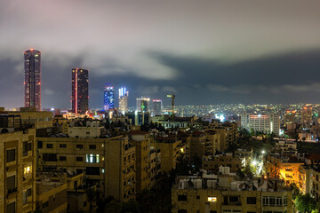 Fototapeta premium Amman, Jordan The skyline of the city at night.