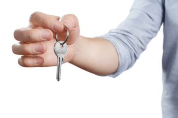 Hand with a house key cut out