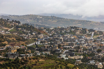 Fototapeta na wymiar Ajloun, Jordan A foggy hill on the road to Jarash.
