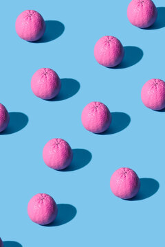 Pink Oranges Pattern On Blue Background Pastel Colors. Minimal Style.