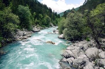 Beautiful blue apline river Koritnica, popular outdoor destination, Bovec, Slovenia, Europe.