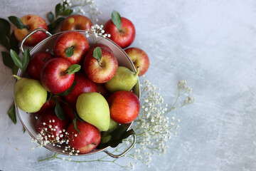 Beautiful shiny red apples on a table. Still life with organic fruit. Healthy eating concept. 