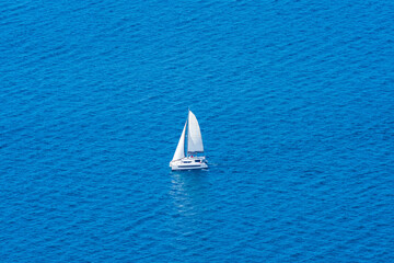 A catamaran yacht on the Gibraltar Bay, Gibraltar, UK