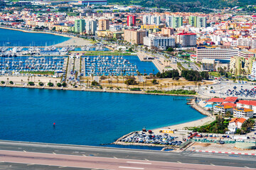 View of the Gibraltar airport runaway and Spanish town La Linea de Conception from the Upper Rock. UK