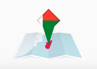 Madagascar is depicted on a folded paper map and pinned location marker with flag of Madagascar.