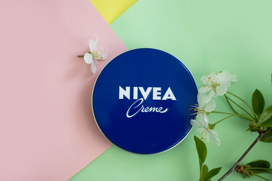May 2, 2022 Ukraine city Kyiv cream Nivea, flower on a colored background