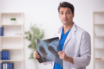 Young male doctor radiologist working in the clinic