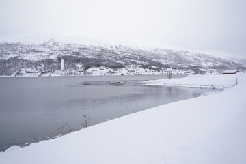 snowy landscape view in tromso fjords, norway