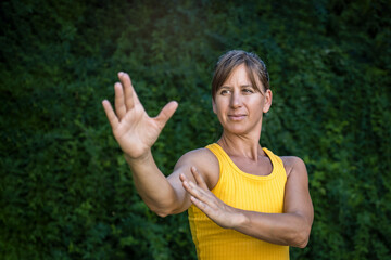 Close up of a woman practitioner of Tai Chi and Chi Kung.