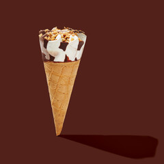 Ice cream with cone on brown pastel background