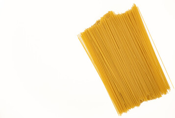 Dry spaghetti isolated on white.