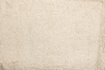 Whole grain flour background. Texture of rye flour.