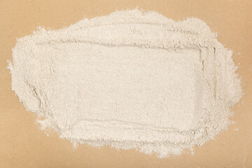Flour is scattered on the table.