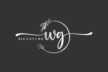 luxury signature initial wg logo design isolated leaf and flower