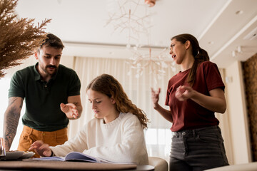 Parents feeling not happy with the grades of their daughter.
