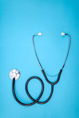 Stethoscope on a blue background. Cardiology concept