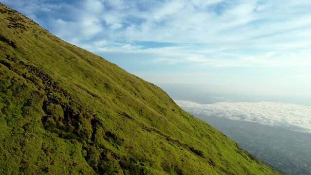 Aerial view of Mount Sindoro in Indonesia with noise cloud. With Selective focus. 