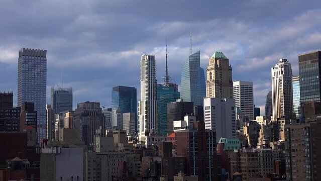 Lockdown Shot Of Various Tall Buildings In City Against Cloudy Sky - New York City, New York
