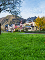 Low angle, grass level shot of Ediger-Eller village houses during autumn in Cochem-Zell district, Germany