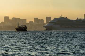 Transatlantic ship in Guanabara Bay in Rio de Janeiro, Brazil with a hill in the background....