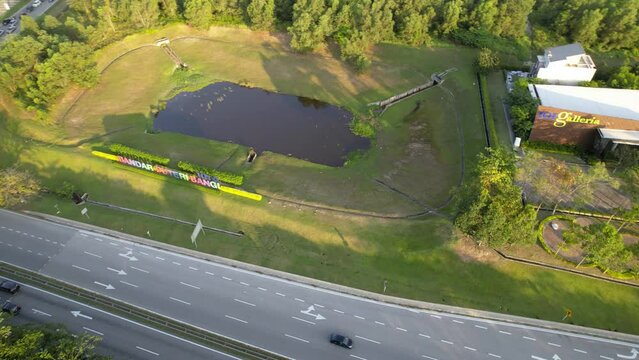 Selangor, Malaysia - March 28, 2023 Aerial pan to the left near the Bandar Puteri Bangi and IOI Galleria during sunset