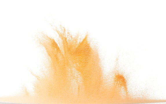 Small size orange Sand flying explosion, fruit sands grain wave explode. Abstract cloud fly. Orange colored sand splash throwing in Air. White background Isolated high speed shutter, throwing freeze