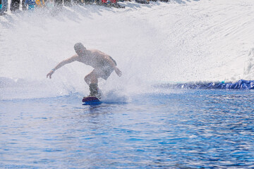 People are enjoying Pond skim at the end of ski season