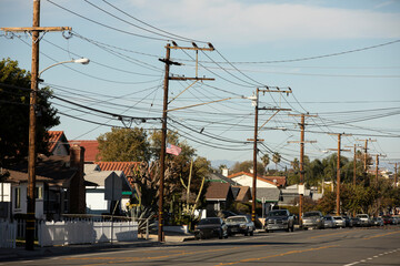 Lomita, California, USA - November 25, 2022: Afternoon sun shines on a residential neighborhood...