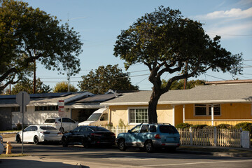 Lomita, California, USA - November 25, 2022: Afternoon sun shines on a residential neighborhood...