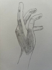 Graphite pencil sketch of hand on white paper