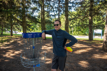 Disc golf is a flying disc sport in which players throw a disc at a target; played using rules like...