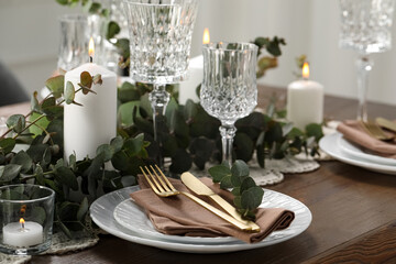 Stylish elegant table setting for festive dinner indoors