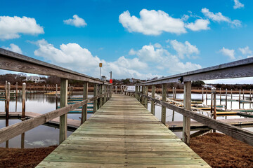 Fototapeta premium Blue sky over the Sesuit Harbor Marina on Cape Cod in East Dennis.