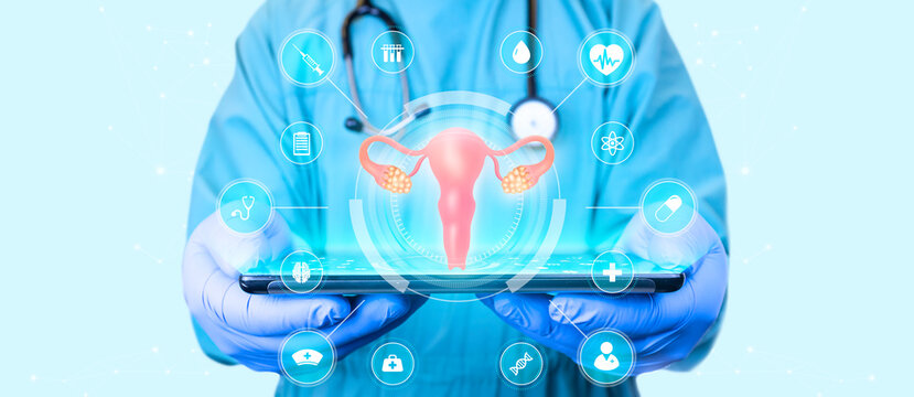Female reproductive health concept. endometriosis, PCOS, gynecologic cancer, cervical cancer, uterine fibroids, hysterectomy. Modern digital medicine. Doctor with tablet on sky background
