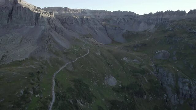 Governor Basin near Ouray, Colorado with Sneffels Mining District in the distance. Aerial 4K drone video in the Rocky Mountains.