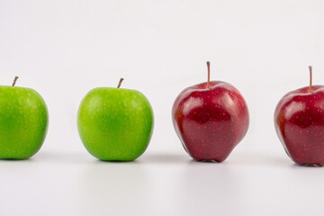 Fresh green and red apple fruit with cut in half and slice isolated on white background.