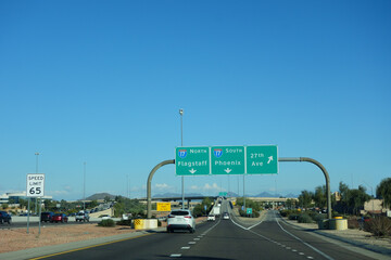 Arizona 101 Loop exit ramp lanes to North and South, toward Flagstaff or Phoenix; copy space