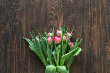 Bouquet of pink fresh tulips. Beautiful Card for Mother's Day or Women's Day.